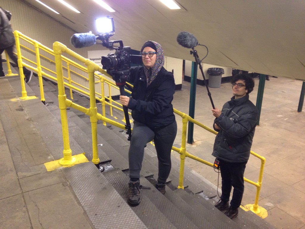 Martyna and Raphael, at the 7 Train Willets Point station, capturing all of the pent-up fan excitement.